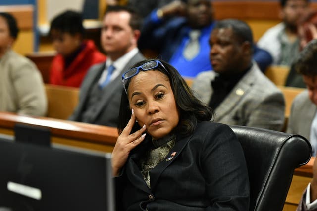 <p>Fulton County District Attorney Fani Willis attends defendant Harrison Floyd's bond revocation hearing at the Fulton County Courthouse in Atlanta, Georgia</p>