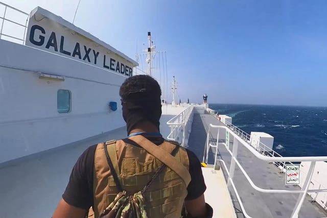 <p>This handout screen grab captured from a video shows Yemen's Houthi fighters' takeover of the Galaxy Leader Cargo in the Red Sea coast off Hudaydah, on 20 November 2023 in the Red Sea, Yemen</p>