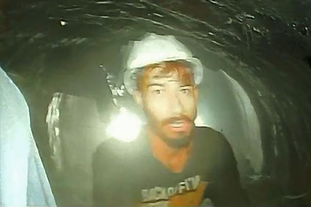 <p>This picture released by Department of Information and Public Relation (DIPR) Uttarakhand and taken with endoscopic camera on 21 November 2023 shows a worker trapped inside the under-construction tunnel, days after it collapsed in the Uttarkashi district of India's Uttarakhand state</p>