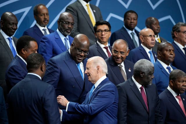 <p>US president Joe Biden talks with African leaders before they pose for a family photo during the US-Africa Leaders Summit at the Walter E Washington Convention Center in Washington, 15 December 2022</p>