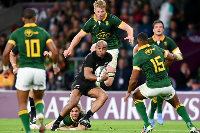 <p>Mark Telea of New Zealand breaks through South Africa in the last meeting between the sides in August at Twickenham</p>