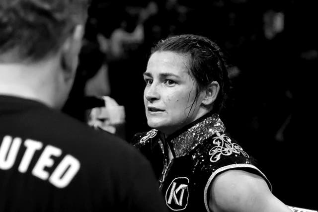 <p>Katie Taylor reacts to the first loss of her pro career, against Chantelle Cameron</p>